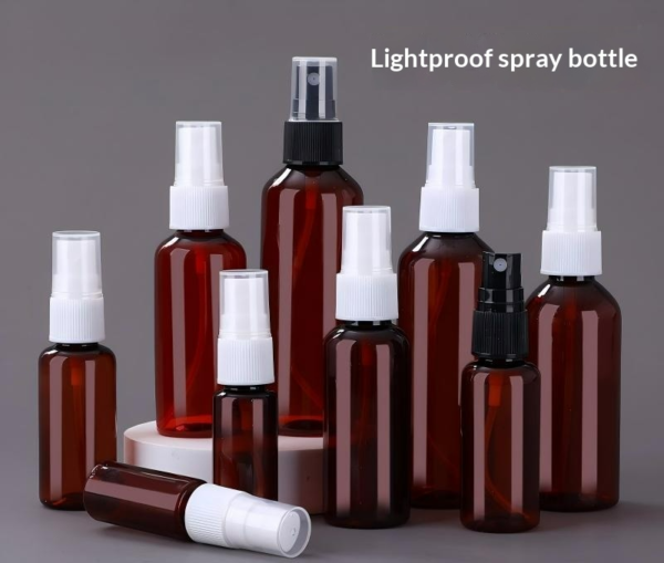 Amber Spray Bottle 100ml with White Nozzle on White Background