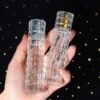 Bamboo Texture Spray Bottles Silver and Gold in Hand
