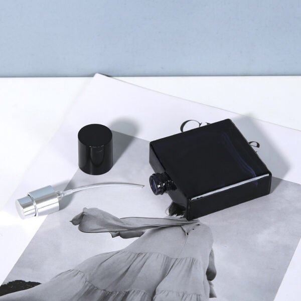 Black Bottle Cap and Silver Sprayer Components