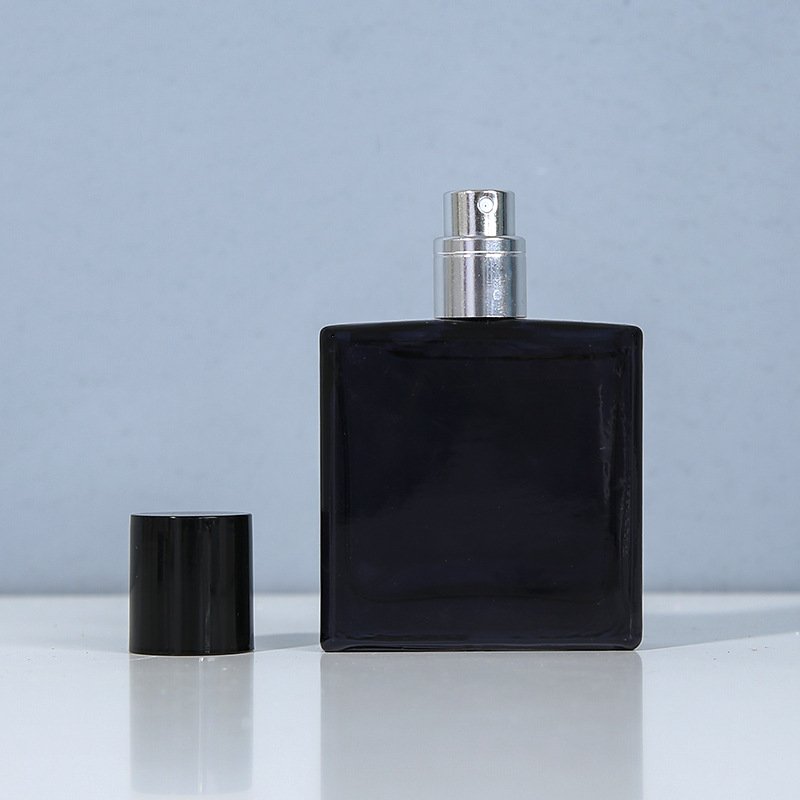 Black Square Glass Bottle with Cap Beside