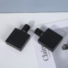 Black Square Bottles Angled Pair Scene