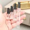 Mini Glass Spray Bottles in Hand Size Comparison