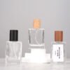 Three Glass Perfume Bottles Black Beech Walnut Caps