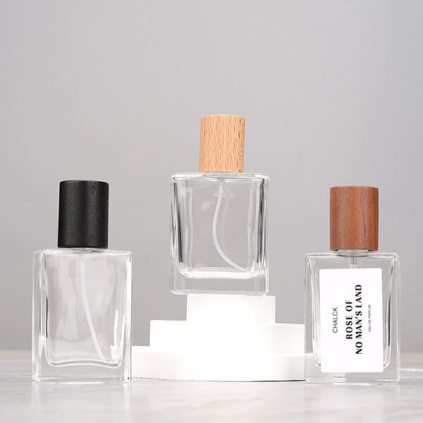 Three Glass Perfume Bottles Black Beech Walnut Caps