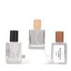 Three Square Glass Spray Bottles with Wooden Caps