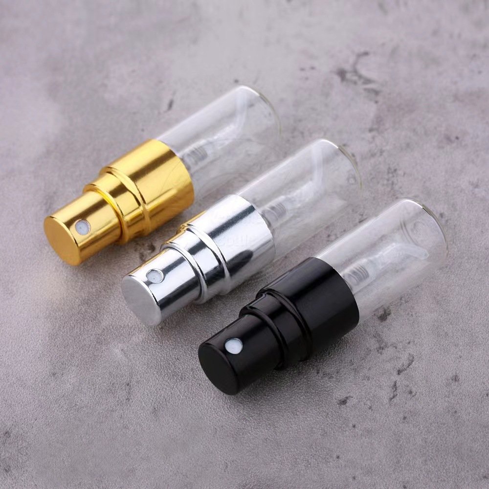 Mini Glass Spray Bottles Gold Silver Black Atomizers on Marble