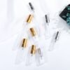 Eight Mini Glass Spray Bottles Gold and Silver