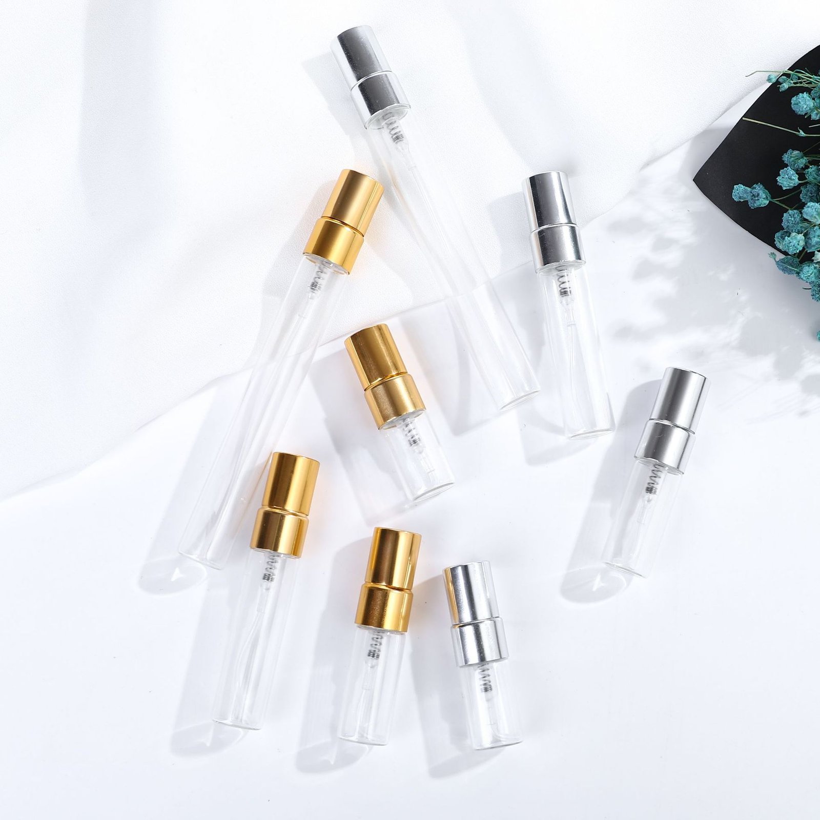 Eight Mini Glass Spray Bottles Gold and Silver