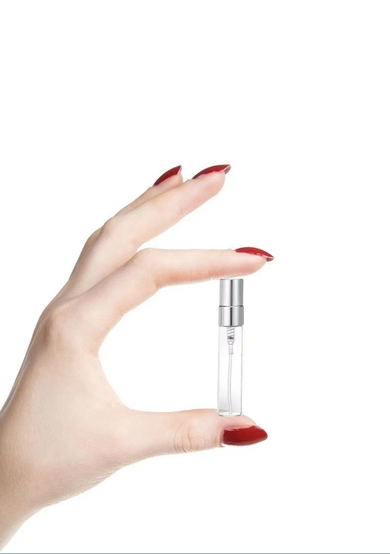 Pocket Size Mini Glass Spray Bottle Held in Hand