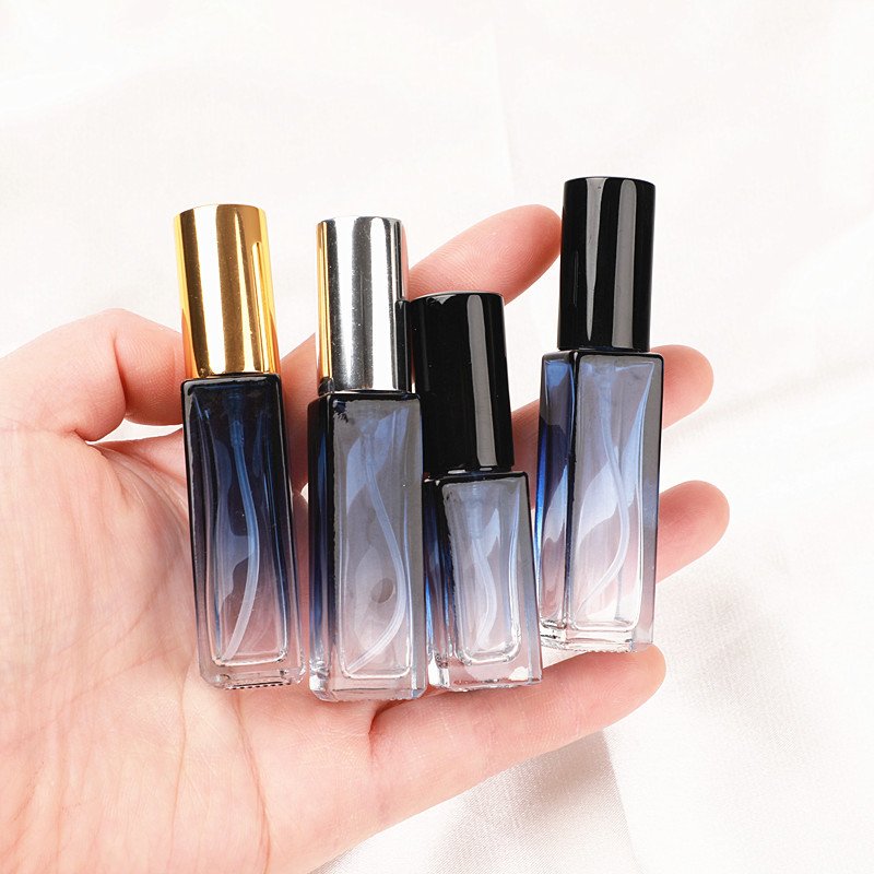 Compact Gradient Blue Spray Bottle in Hand