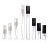 Slim Glass Perfume Bottles with Black Sprayers and Flowers