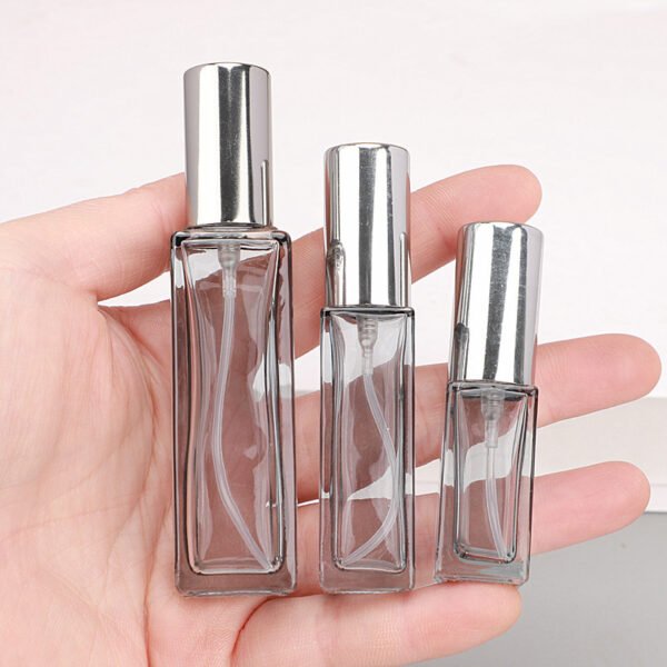 Smoke Grey Spray Bottles Three Sizes in Hand