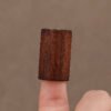 Dark Beech Wooden Cap Close-up on Finger