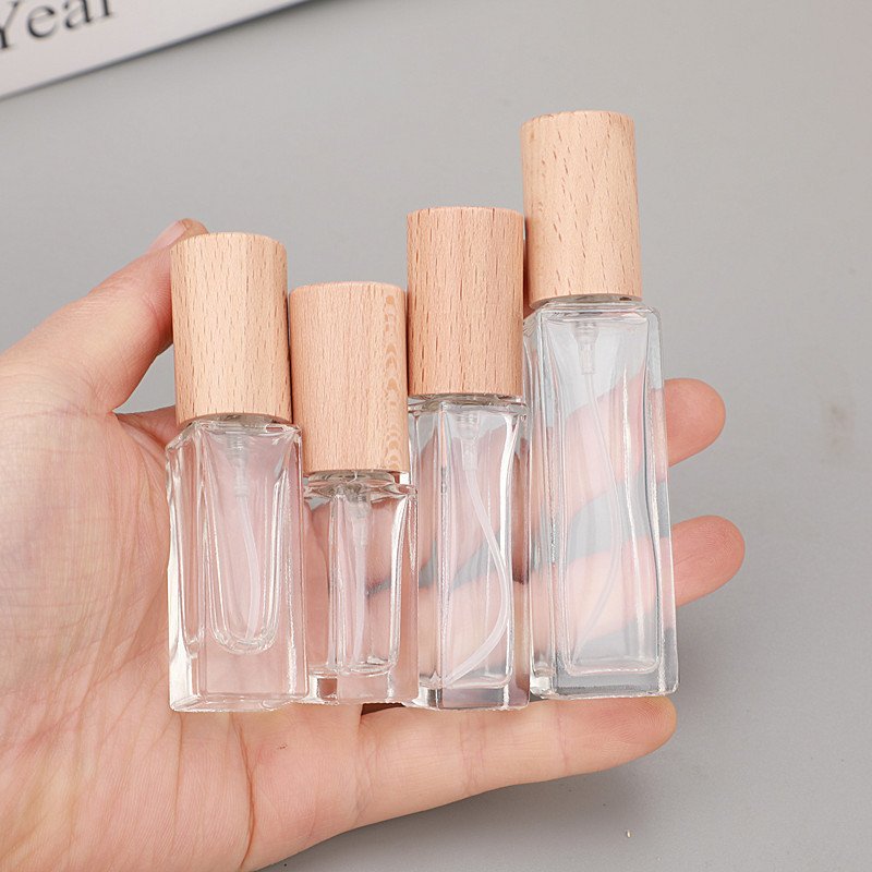 Beech Wooden Cap Bottles in Hand Four Sizes